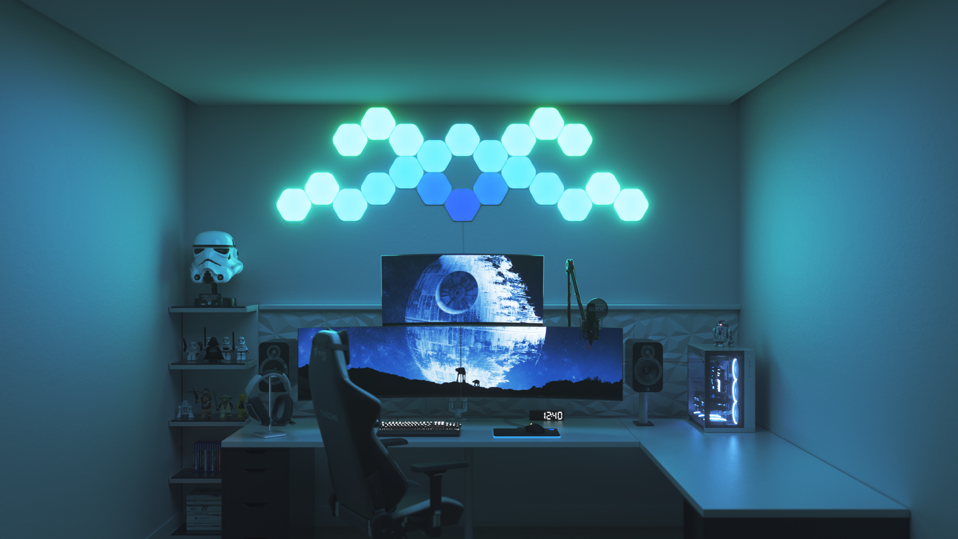 Futuristic style gaming setup with Nanoleaf Shapes Hexagon smart home LED light panels above the PC monitor. The best color lights for gamers.