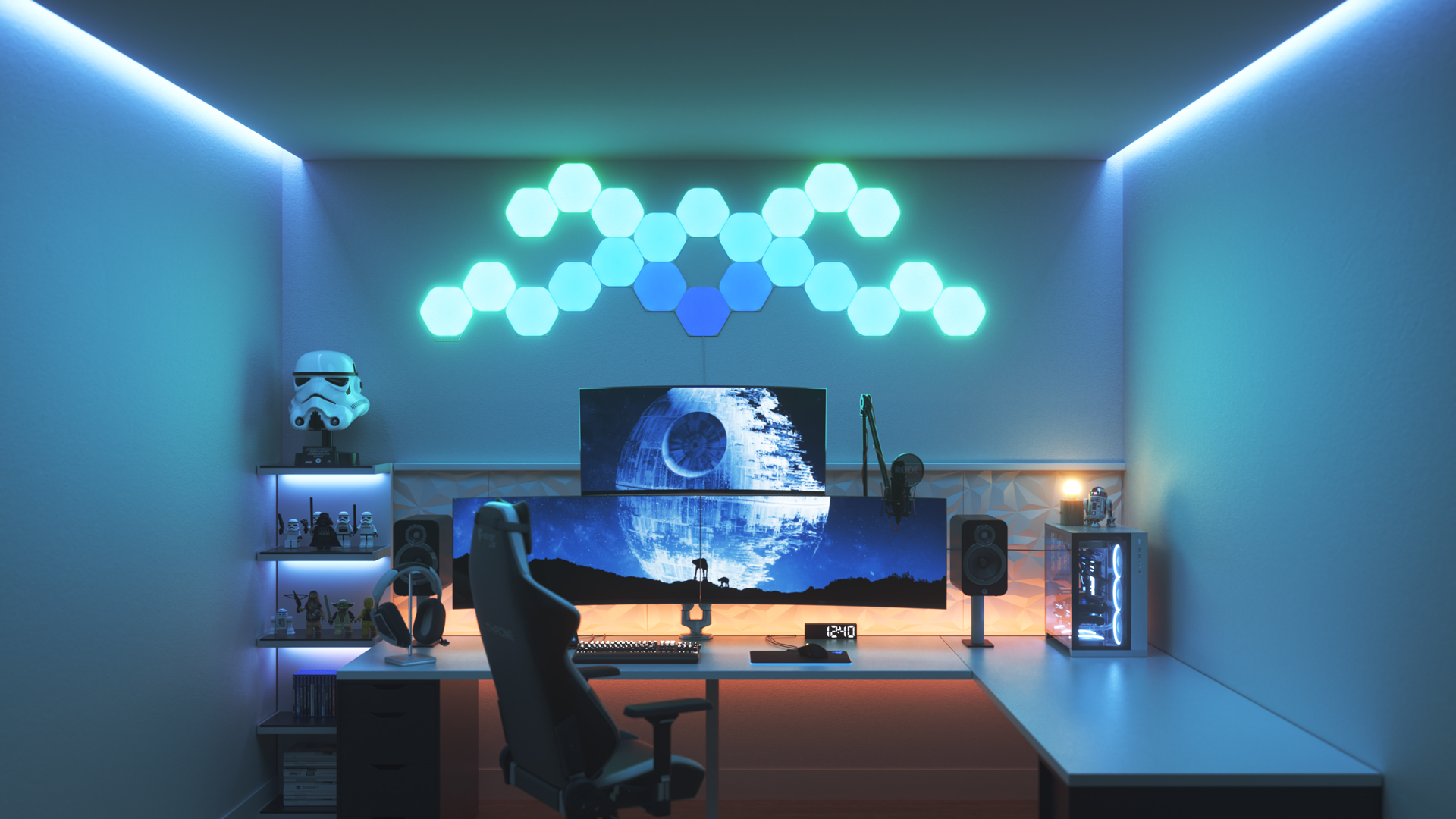 Futuristic style gaming setup with Nanoleaf Shapes Hexagon smart home LED light panels above the PC monitor. The best color lights for gamers.