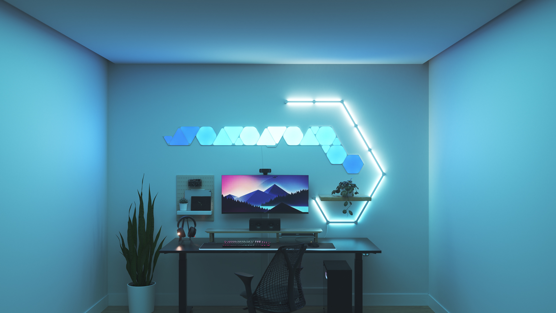 Minimalistic style gaming setup with Nanoleaf Shapes smart home RGB light panels above the monitor. PC games are better with these gaming lights.