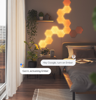 This is an image of a 13 panel Nanoleaf Elements layout mounted onto the wall behind a bed frame and above a night stand. Modular smart light panels that are secured to the walls with included adhesives and connected together with linkers. The wood look hexagons are the perfect decorative piece that adds style and personality in the bedroom while doubling as a customizable ambient light.